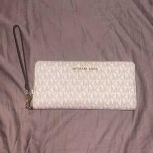 MK woman’s wallet never used.